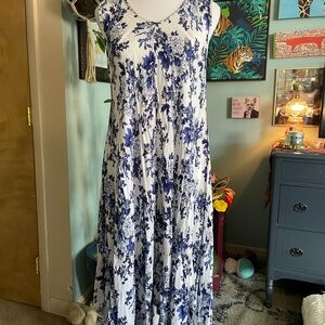 Sleeveless White Maxi Dress with Blue Floral Print